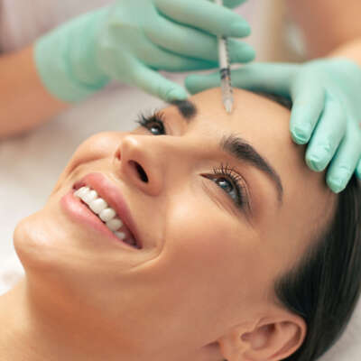 Cheerful,Young,Woman,Feeling,Good,While,Undergoing,Hyaluronic,Acid,Injection Cheerful,Young,Woman,Feeling,Good,While,Undergoing,Hyaluronic,Acid,Injection